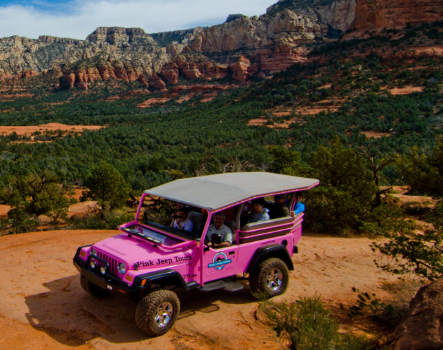 Pink Jeep on Red Rocks