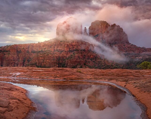 slick rock clouds and water on rocks