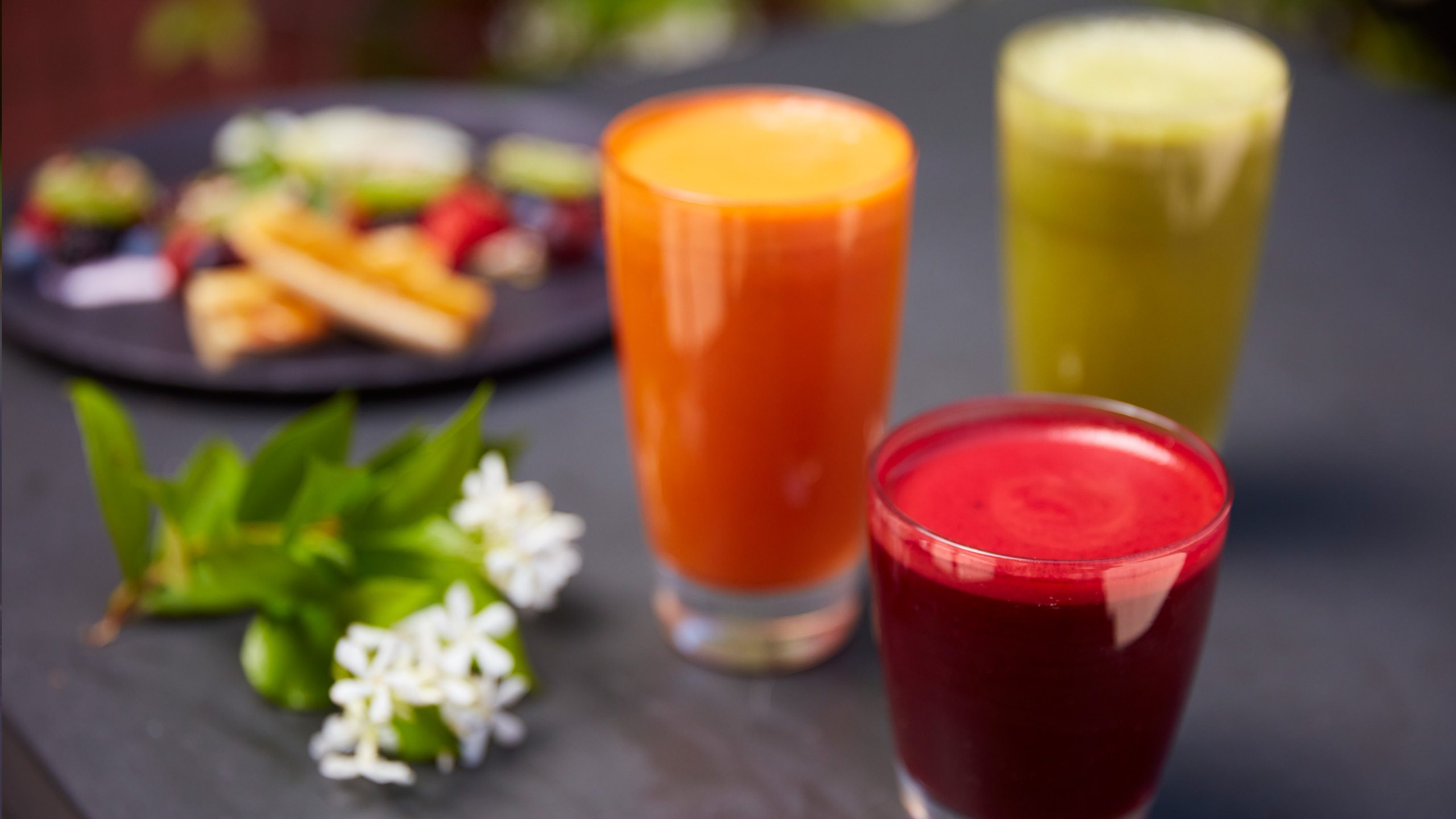 fresh juices, orange, green and red