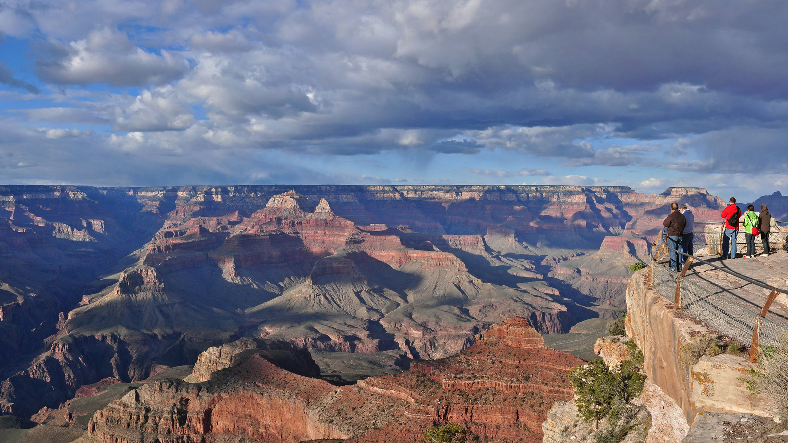 grand canyon with clouds in sky