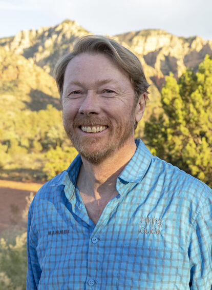 man with blue checkered shirt