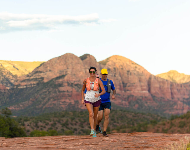 two runners on trail