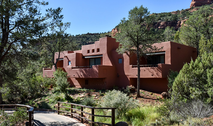 casita with pathway in front and trees