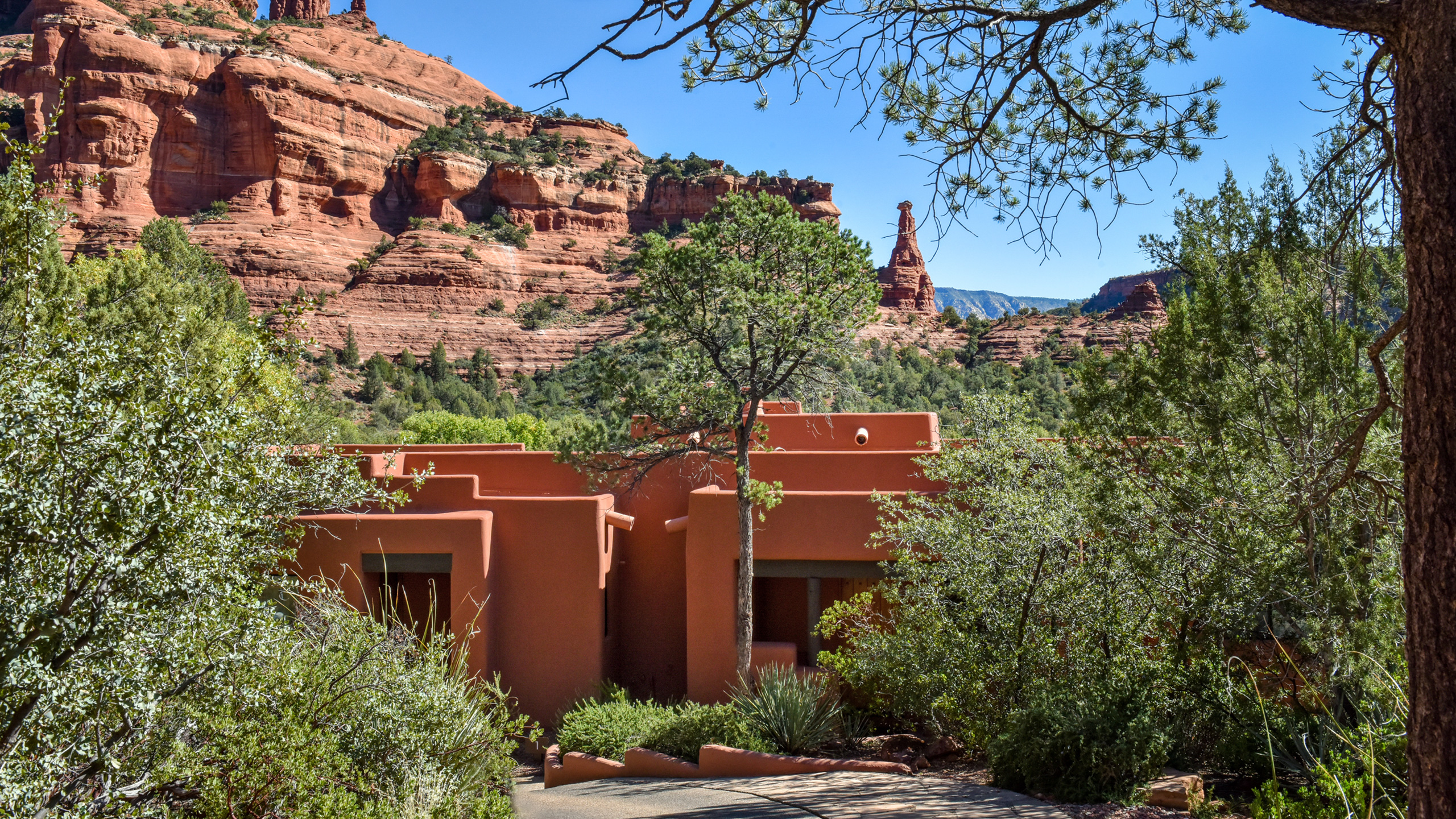 clay colored casita with Kachina woman rock formation