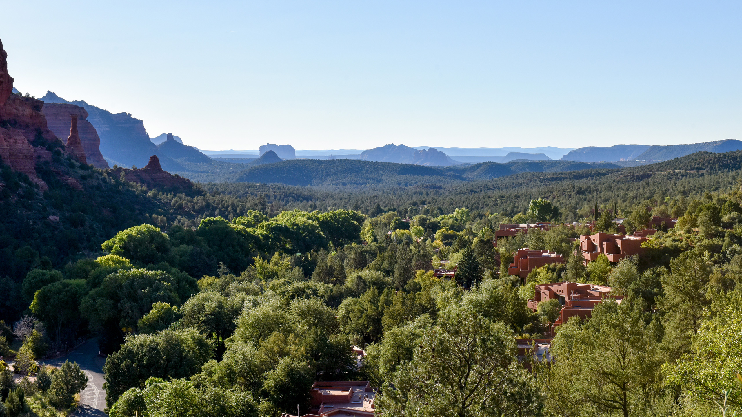 view of lush vegetation and red rock formations