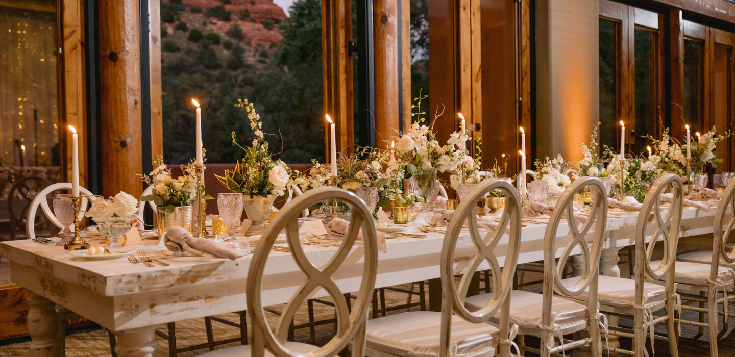 banquet dinner setup with candles at dusk