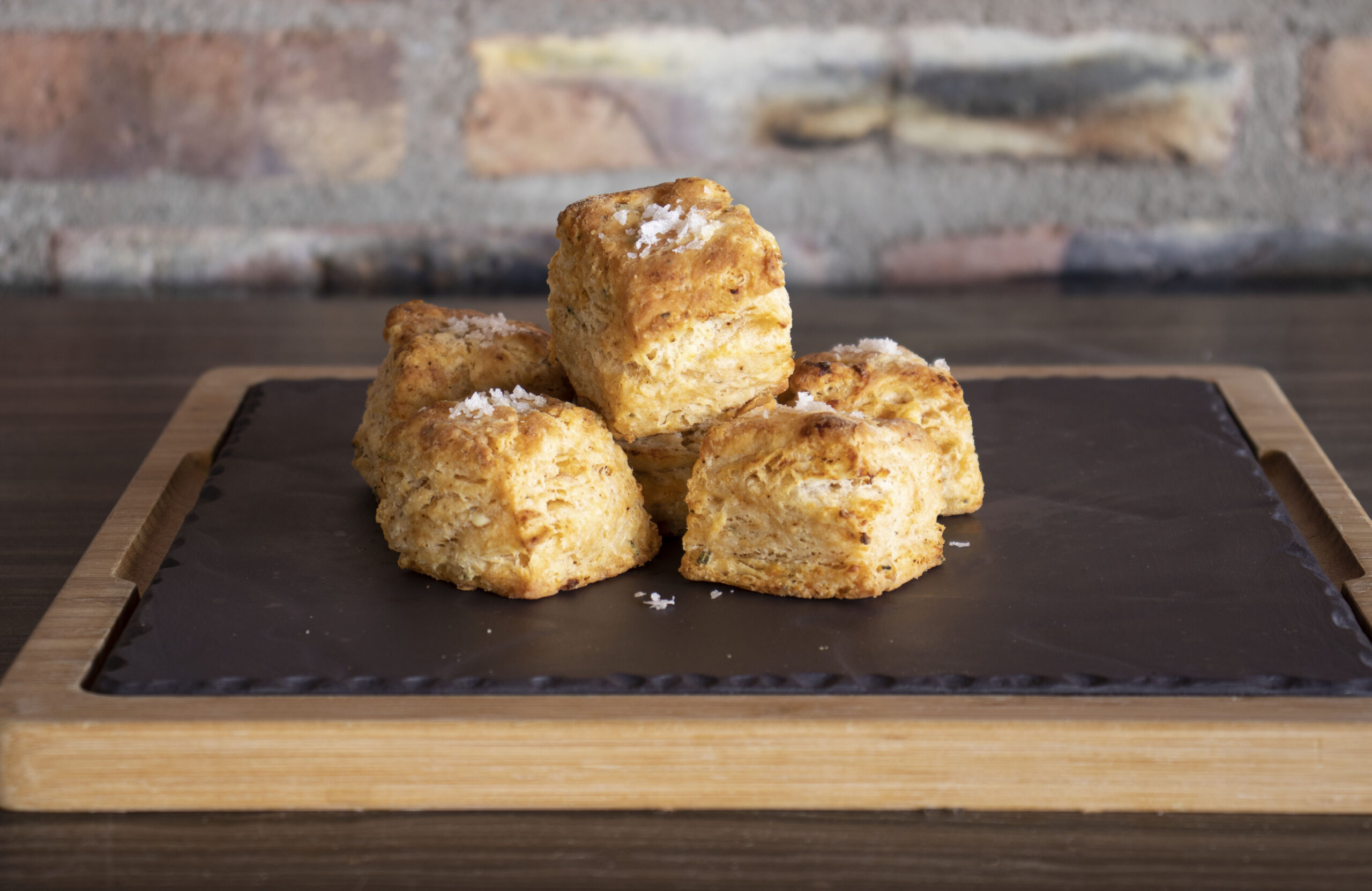 plate of biscuits topped with flaked sea salt