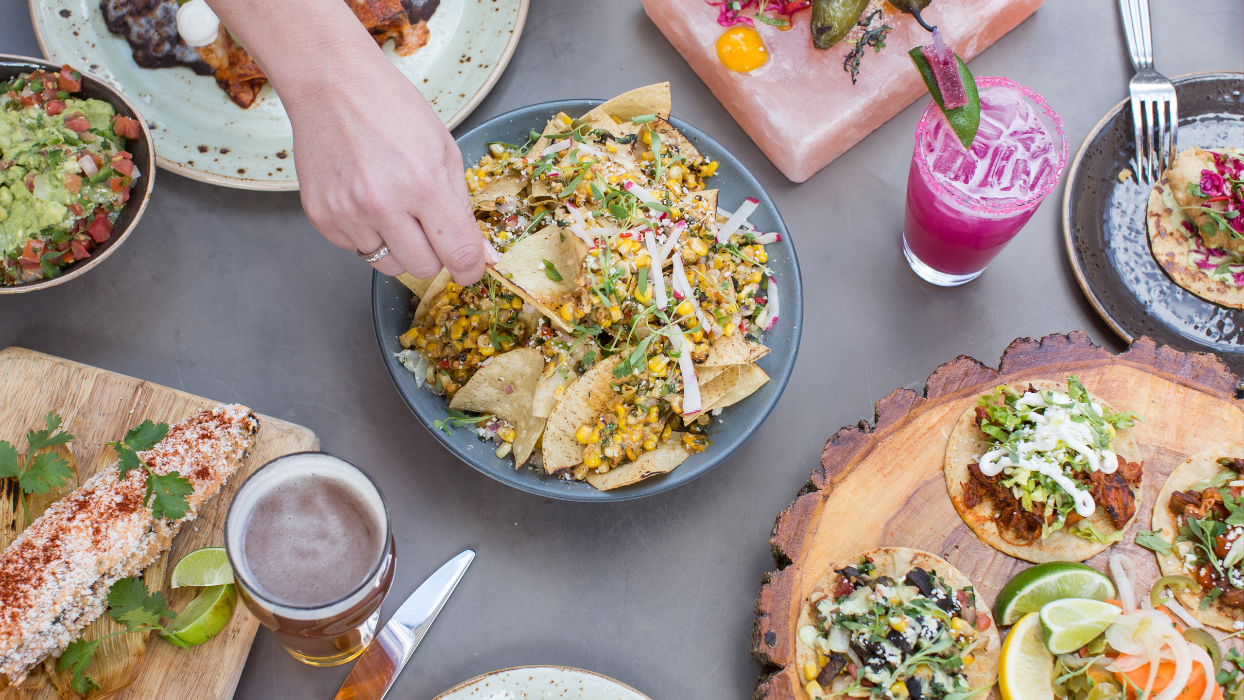 table full of colorful food