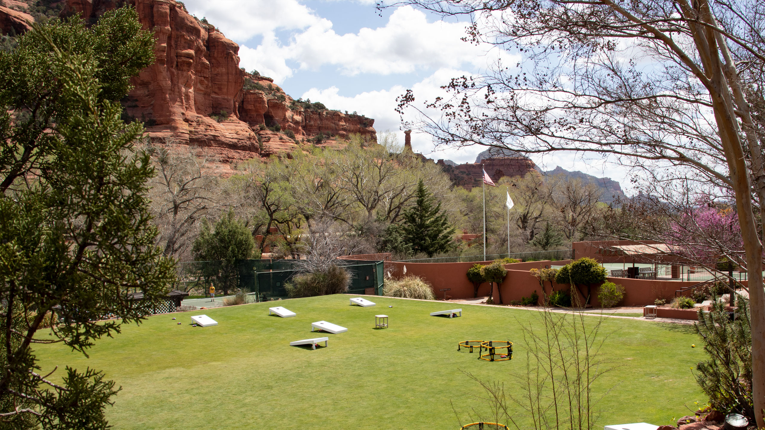 activities lawn at Enchantment Resort with cornhole