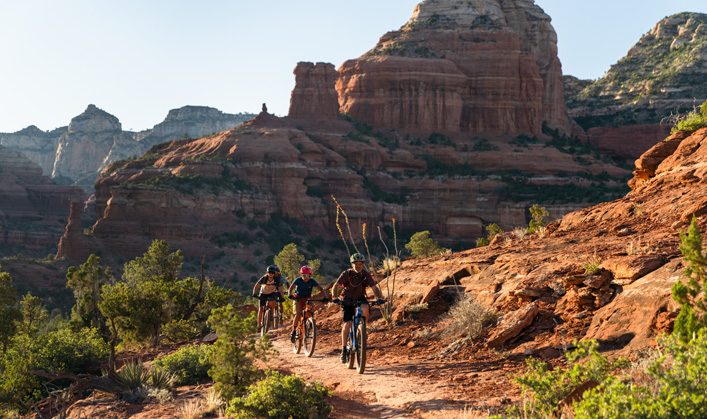 group of mountain bikers on trail in Sedona