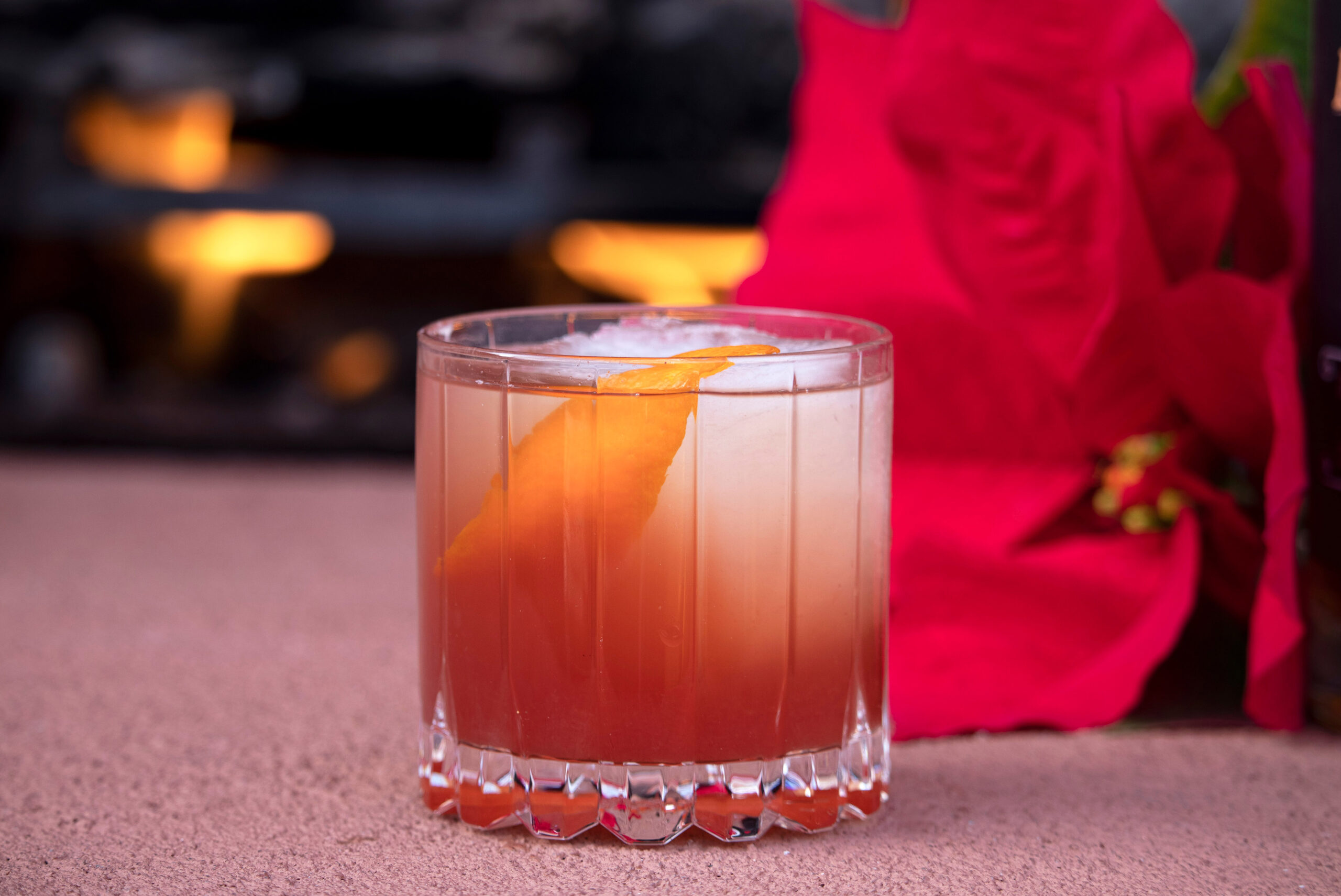 bourbon drink with poinsettia