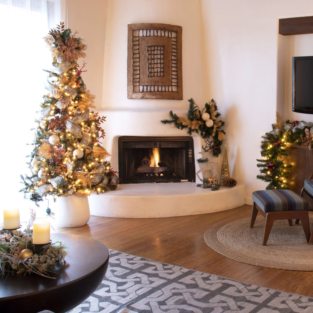 guest room with tree and fireplace