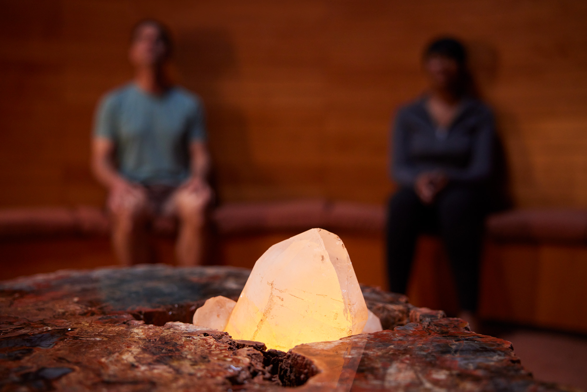 crystal glowing at Mii amo with two people meditating