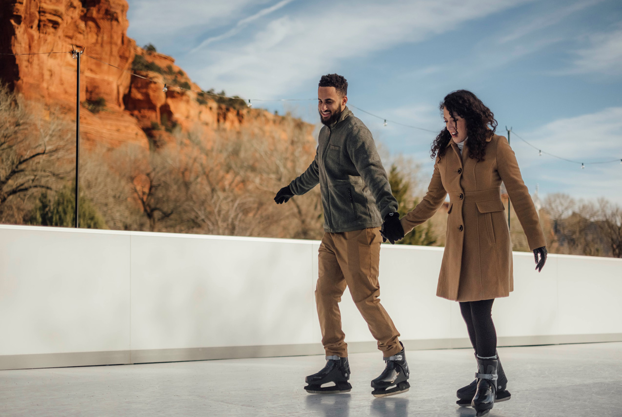 2 ice skaters in the red rocks