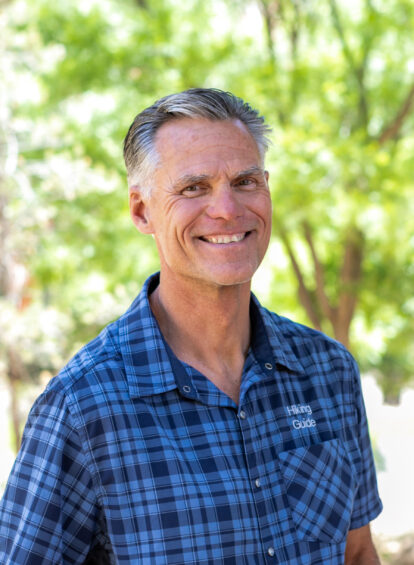 Man with blue checkered shirt