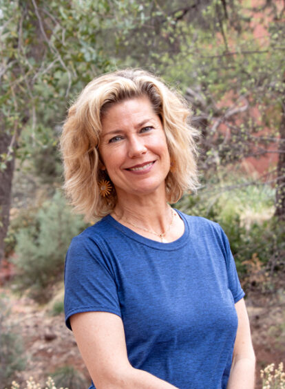 female hiking guide in blue shirt