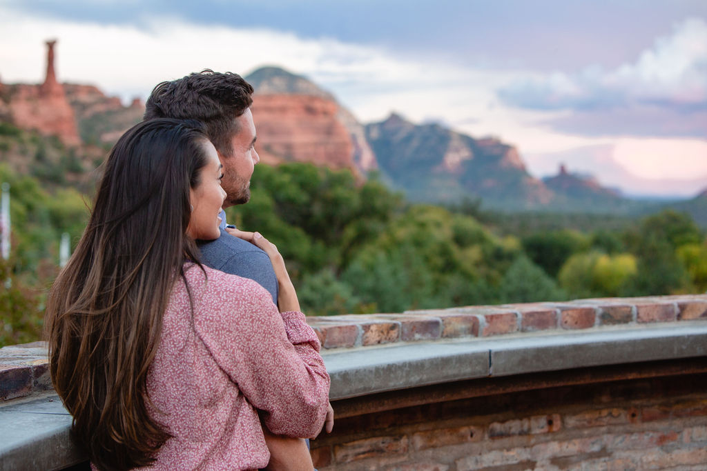 couple looking out to view of Sedona's red rock formations at Enchantment Resort