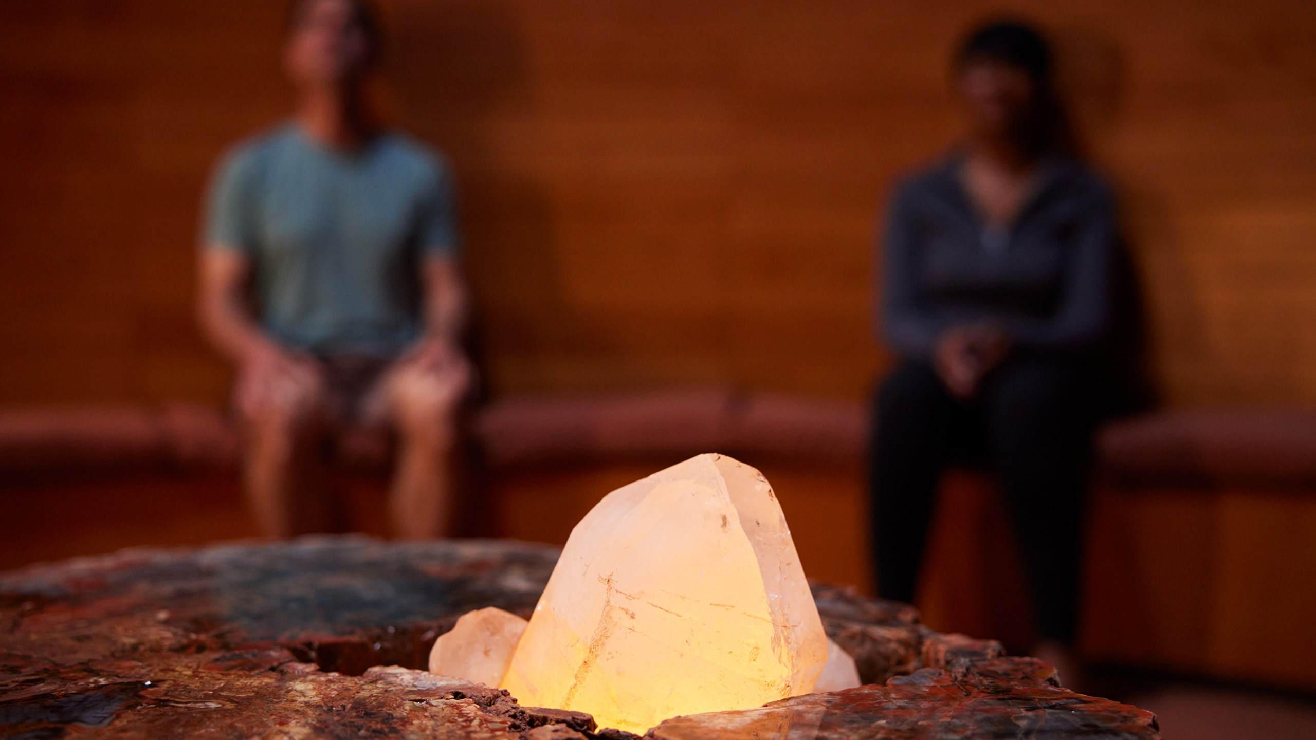 crystal glowing at Mii amo with two people meditating
