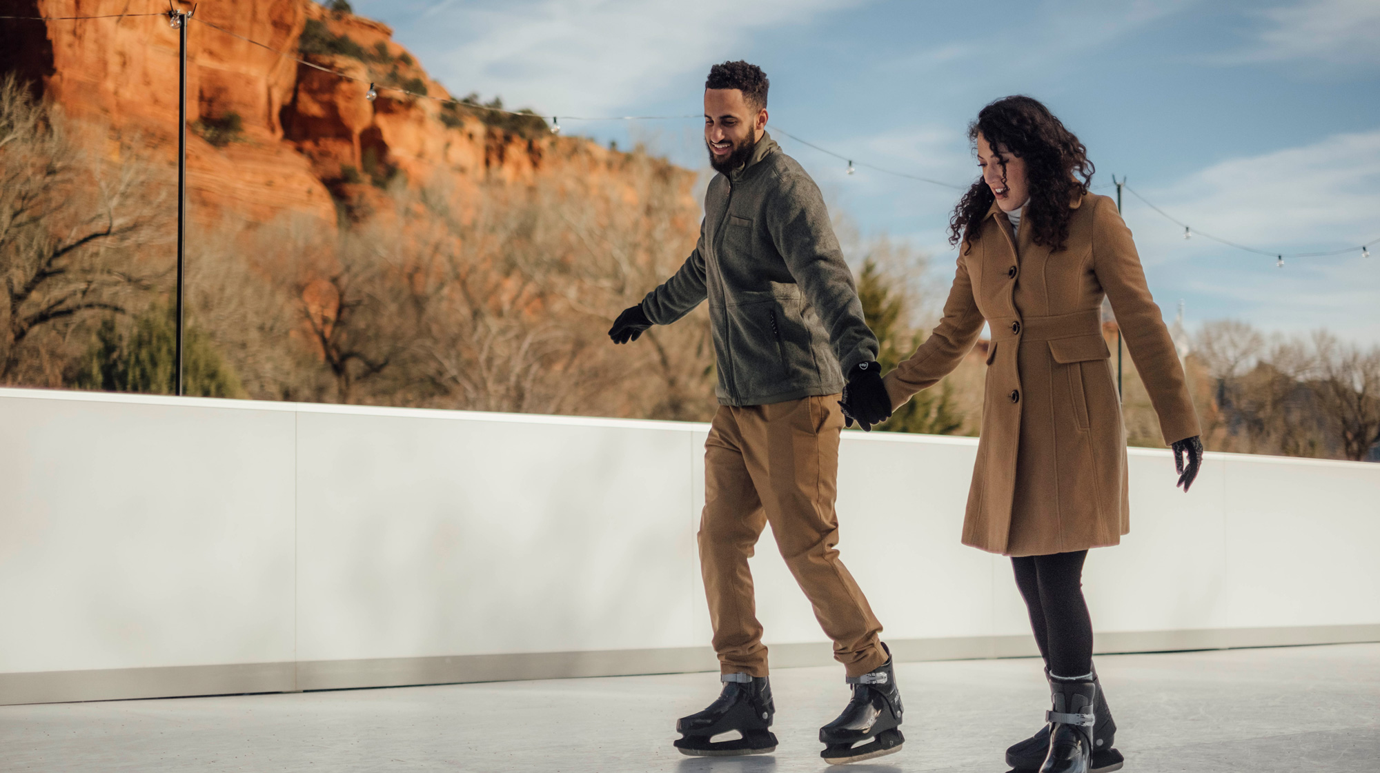 2 ice skaters in the red rocks