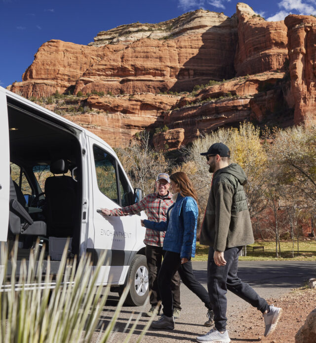 Driving Tours at Enchantment Resort, couple entering tour van with red rocks in background
