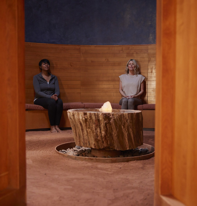 two women meditating in the Mii amo Crystal Grotto