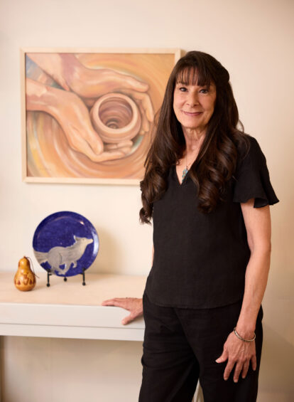 female artist in black shirt and pants